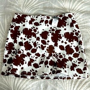 Cow print mini skirt, size Large